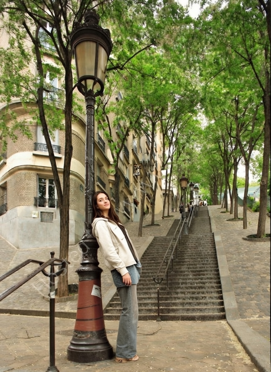 Montmartre staircases in Paris showing leading lines, cobblestones, and village charm - best photographed during golden hour